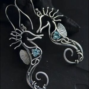 Hollow silvery seahorse with blue zircon
