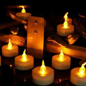 Warm flickering candle with remote, battery operated electronic
