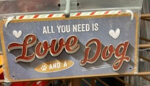 LOVE AND A DOG hanging sign